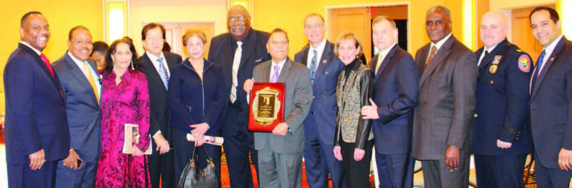Dr. Parveen Chopra with the Presidential Philanthropy Award. Seen in the picture, from L to R: Dr. Kenneth Saunders; Reverend Dr. Reginald Tuggle; Usha Chopra (Past president - India Association of Long Island); Kailash & Mina Sharma ( Past President- Nargis Dutt Memorial Foundation); Julius Pierce ( President / Founder MLK Birthday Celebration Committee) Dr. Parveen Chopra ( Presidential Philanthropy Award Honoree); : Honorable Judge Peter Skelos; Honorable Judge Ruth Balkin; Honorable Judge Anthony Paradisio; Henry Holley ( Hempstead Housing Authority) Lieutenant Commander Gary Shapiro - Nassau County Police Department; Samir Chopra