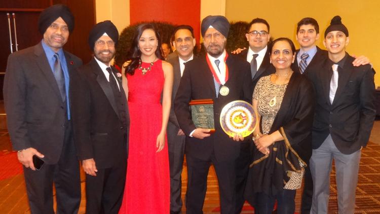 Indian American Exemplary Community Service Award winner Amarjit Singh M.D with friends at the 32th. Asian American Coalition of Chicago Lunar New Year Celebration [Phot by PCS] (Posted by Suresh Bodiwala, Community Contributor)