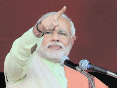 Is Hindutva baggage diluting Modi's development focus