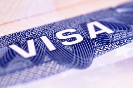 Detail from a US visa document. Selective focus with point of focus in the center of the picture.