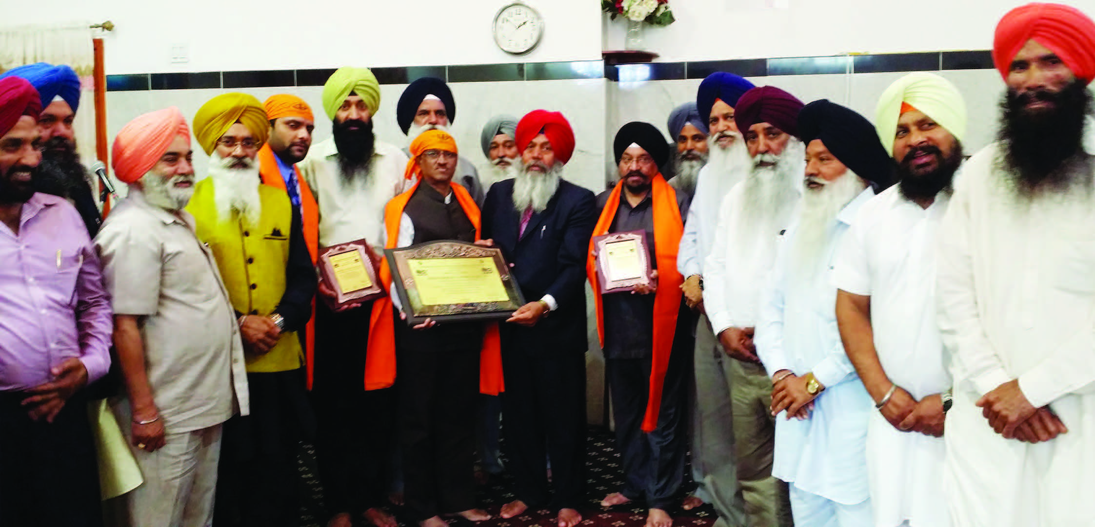 The management of Gurdwara Baba Makhan Shah Lobana , led by its President Himat Singh Sarpanch, honored Ambassador Dnyaneshwar Mulay, Consul General of India in New York, with a plaque, May 31, 2015. Also honored on the occasion were Cox & King Manager Ranjeet Singh and The Indian Panorama editor, Prof. Indrajit Singh Saluja.