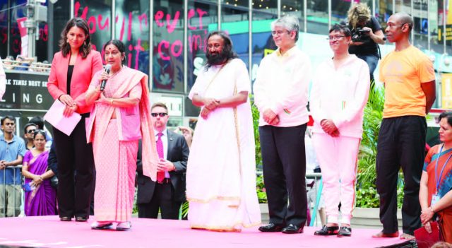 India's External Affairs Minister Sushma Swaraj addresses the huge gathering of Yoga lovers at the iconic Times Square in New York