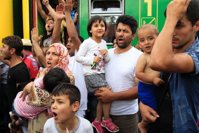 PHOTO: Migrants protest at the railway station in the town of Bicske, Hungary, September 3, 2015. (Reuters: Bernadett Szabo)