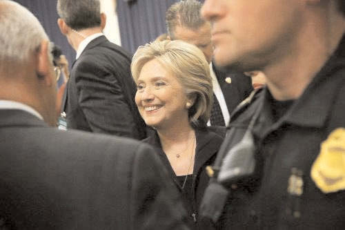 Democratic presidential candidate and former secretary of state Hillary Clinton leaves after a hearing before the House select committee on Benghazi. (AFP photo)