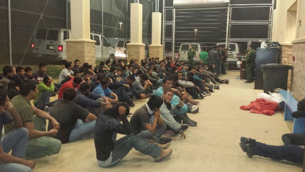 The picture was taken recently at a Customs and Border Protection facility in South Texas. It shows unidentified immigrants who have been detained after crossing the U.S.-Mexico border illegally Photo courtesy U.S. Rep Henry Cuellar, D-Laredo.