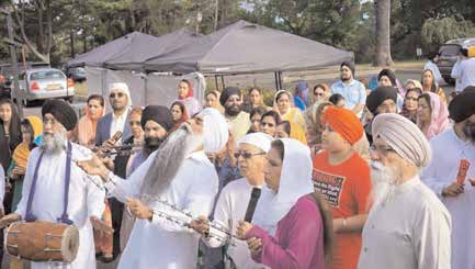 Ecstatic sangat sings Gurbani at the Prabhat Pheri taken out in Gurdwara Glen Cove on September 27