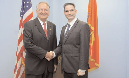 Nassau County Comptroller George Maragos (left) shaking hands with the newly appointed Director of South East/Asian Affairs Dilip Chauhan