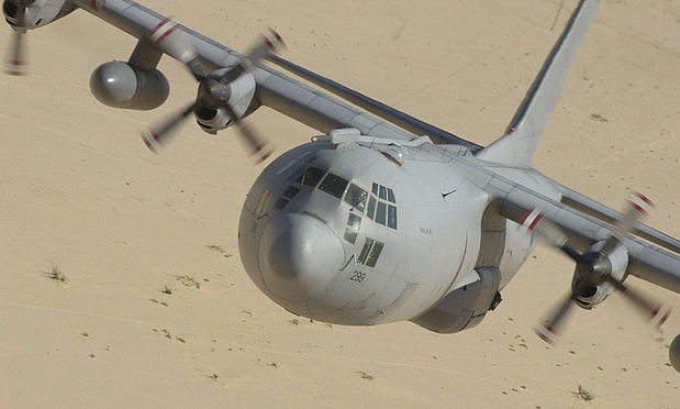 The C-130 Hercules is a cargo plane built by Lockheed Martin. It is powered by four turboprop engines and is used extensively by the military to ship troops and heavy gear
