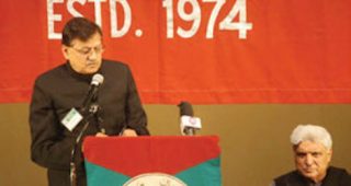 Dr. A. Abdullah. Also seen at right is Javed Akhtar