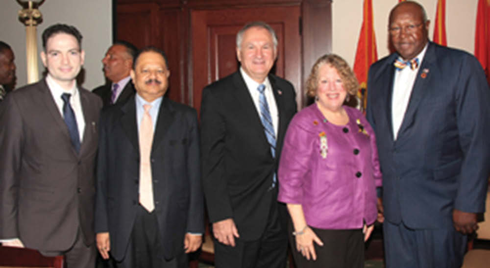 A post appointment picture. From Left : South East/Asian Affairs Director Dilip Chauhan, Comptroller MWBE Advisory Council member Dr. Ajay Lodha, Nassau County Comptroller George Maragos, Deputy Comptroller James Garner