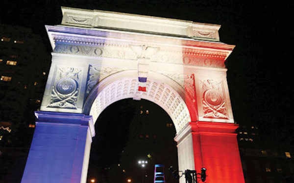 The Washington Square Arch at NYU changes the colors to support France and the people of Paris, on 14th Nov, 2015