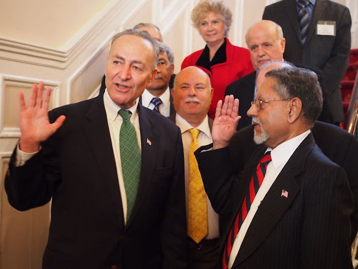 Harbachan Singh being sworn in for his second term as president of Queens Civic Congress (QCC) by US Senator Charles Schumer  