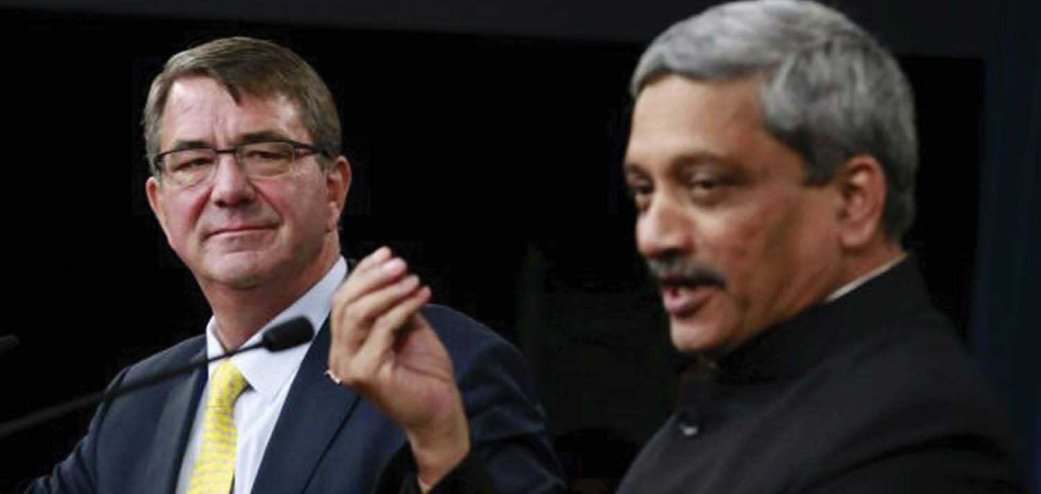 India's Defense Minister Manohar Parrikar (Right) and U.S. Defense Secretary Ash Carter hold a joint press conference after their meeting at the Pentagon in Washington, December 10, 2015.