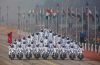 Indian soldiers make formations on motorcycles as they roll down Rajpath during the Republic Day parade in New Delhi.