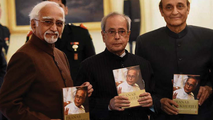 President Pranab Mukherjee with Vice President Hamid Ansari and Senior Congress leader Karan Singh during the release of his memoir “The Turbulent Years- 1980-96