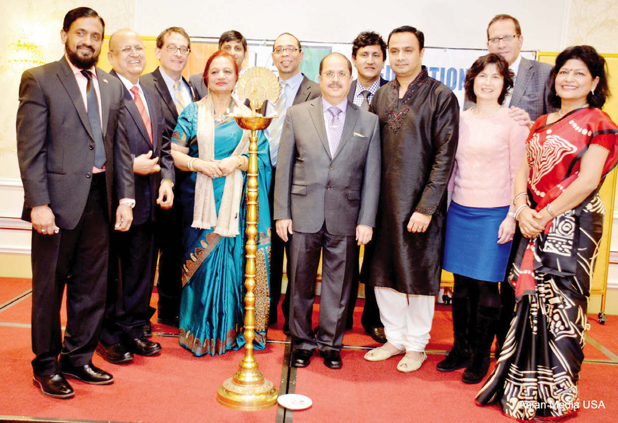Dr. Ausaf Sayeed, Consul General of India in Chicago, FIA official and invited dignitaries at the lighting of the lamp