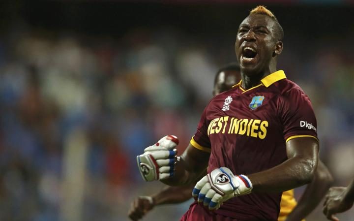 Andre Russel reacts after hitting the winning sixer.