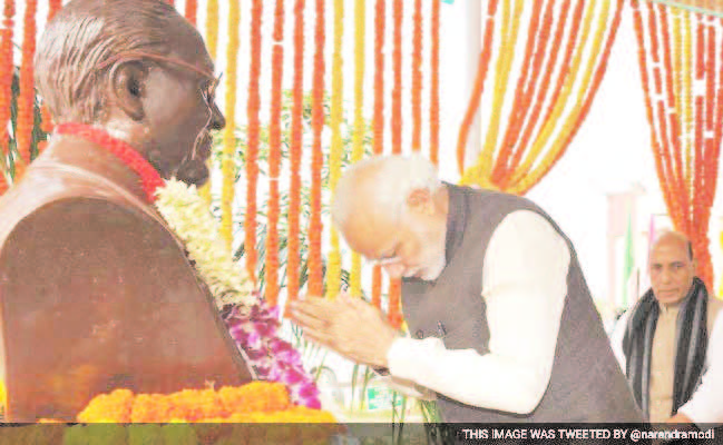 Prime Minister Narendra Modi, April 14, paid rich floral tributes to BR Ambedkar at his birth place in Kalipaltan area of Mhow cantonment town on his 125th birth anniversary. Also seen in the picture is India's Home Minister Rajnath Singh