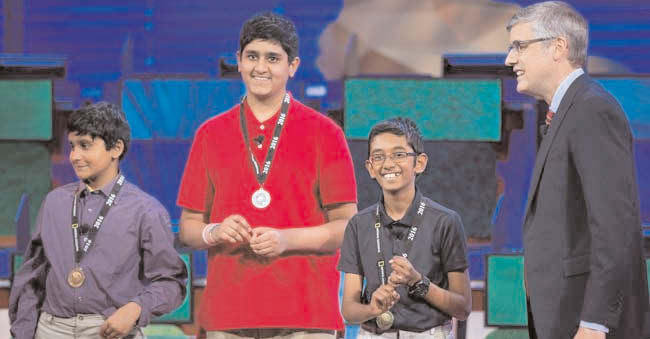 Rishi Nair (second from right) a sixth grader from Florida took top honors at the 28th annual National Geographic Bee held at the National Geographic headquarters in Washington, May 25.