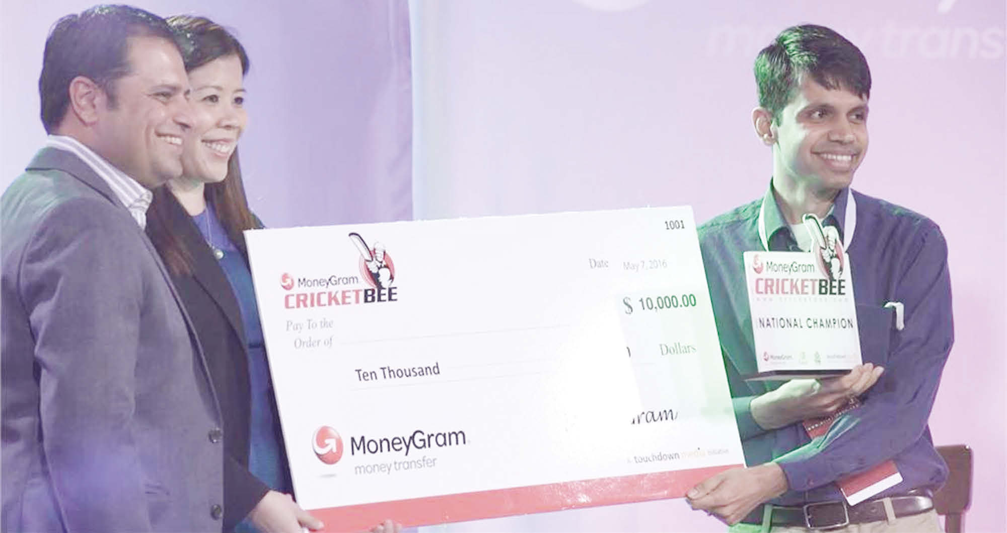 Bharat Jayakumar of Sunnyvale, California bagged the title of Champion and $10,000 prize money. (Left to Right): Rahul Walia, founder of the MoneyGram Cricket Bee, Ivy Wisco, MoneyGram, Bharat Jayakumar, National Champion of the MoneyGram CricketBee