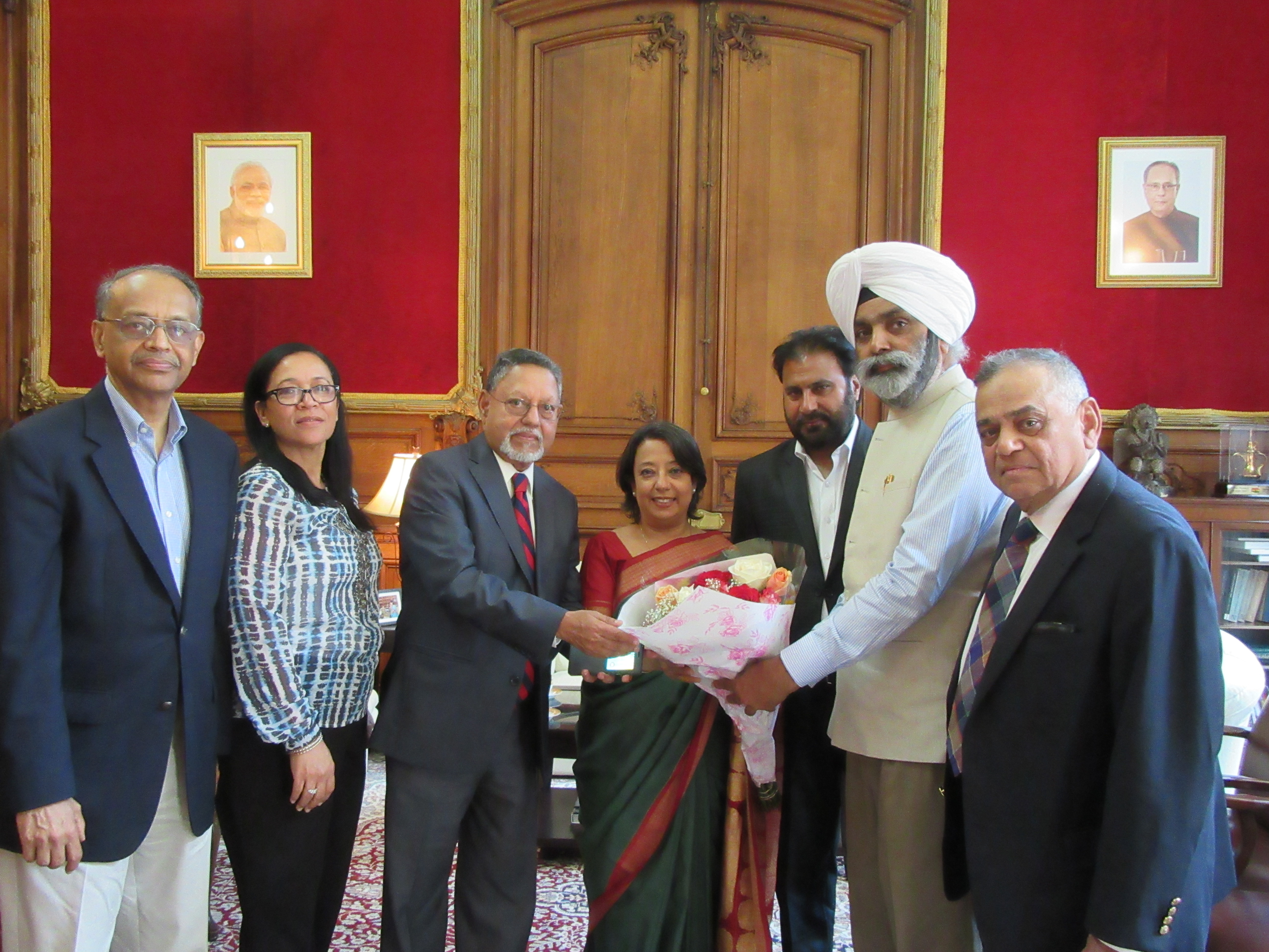 The INOC USA delegates greet Ambassador Das with flowers at the Indian Consulate in New York on May 31, 2016