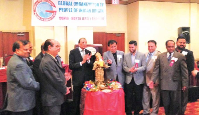 GOPIO-North Jersey Chapter is inaugurated in the presence of dignitaries and GOPIO officials with lighting of the lamp. From l. to. r.: Dinesh Mittal, Lal Motwani, Dr. Manoj Kumar Mohapatra, H.R. Shah, Dr. Sudhir Parikh, Raj Mukherji, Dr. Rajeev Mehta, Dr. Thomas Abraham and Shelly Nichani