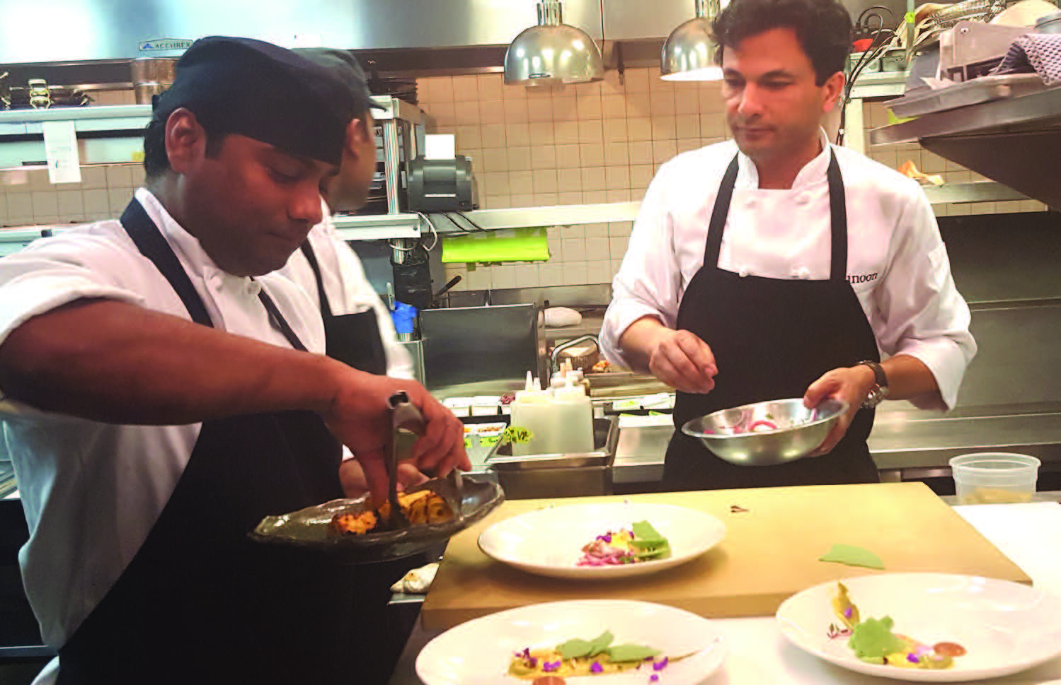 Dheeraj Tomar with celebrity Chef Vikas Khanna (right)