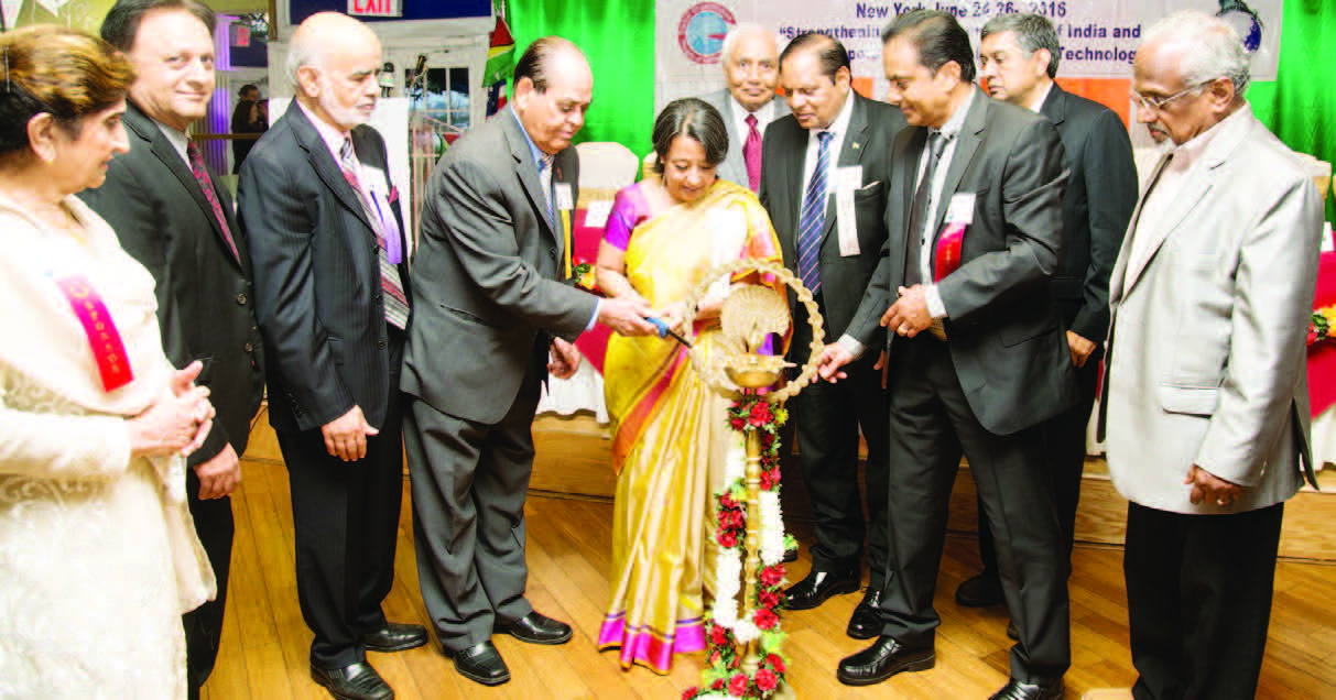 Convention Inauguration with Lighting of the Lamp. From L to R: Dr. Asha Samant, Dr. Rajeev Mehta, Lord Diljit Rana, Lal Motwani, Amb. Riva Ganguly Das, Ram Gadhavi, Guyana Prime Minister Riva Ganguly Das, Noel Lal, Niraj Baxi and Sunny Kulathakal