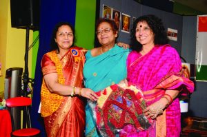 Purnima Ji and Sharda Ji honoring Dr. Bindeshwari Aggarwal (in the center)