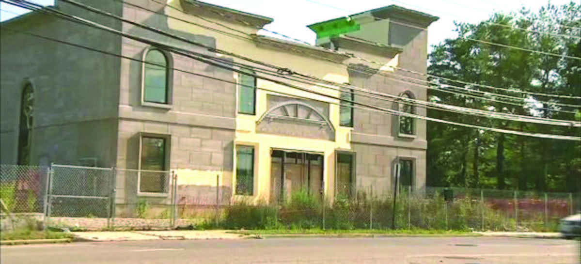 Town of Oyster Bay has prohibited the completion of near- finished house of worship, the Sikh Temple in Plainview, to the great resentment in the Sikh community