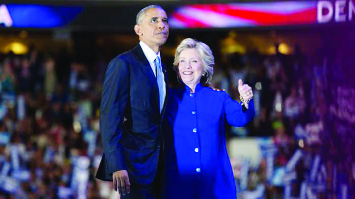 US President Barack Obama hugs Democratic presidential nominee Hillary Clinton on Day 3 of the ongoing convention in Philadelphia, Pennsylvania. #DNCinPHIL,