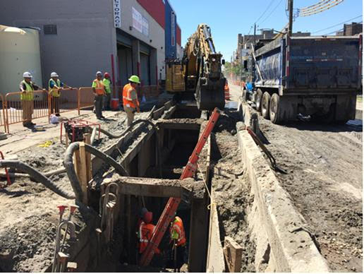 Crew install new sewers on West 21st Street in Coney Island.