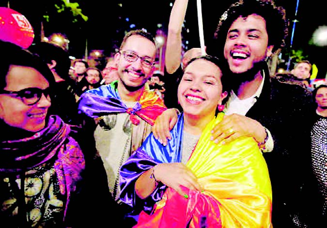 Joyous moment: People celebrate after the peace deal in Bogota on Wednesday, August 24.