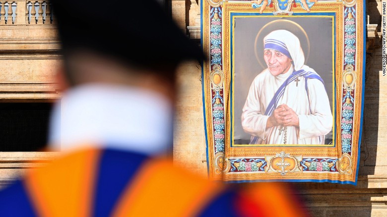 An image of Mother Teresa hangs from the facade of St. Peter's in the Vatican. - Image Courtesy - CNN