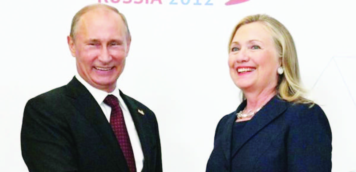 Vladimir Putin (left) and Hillary Clinton