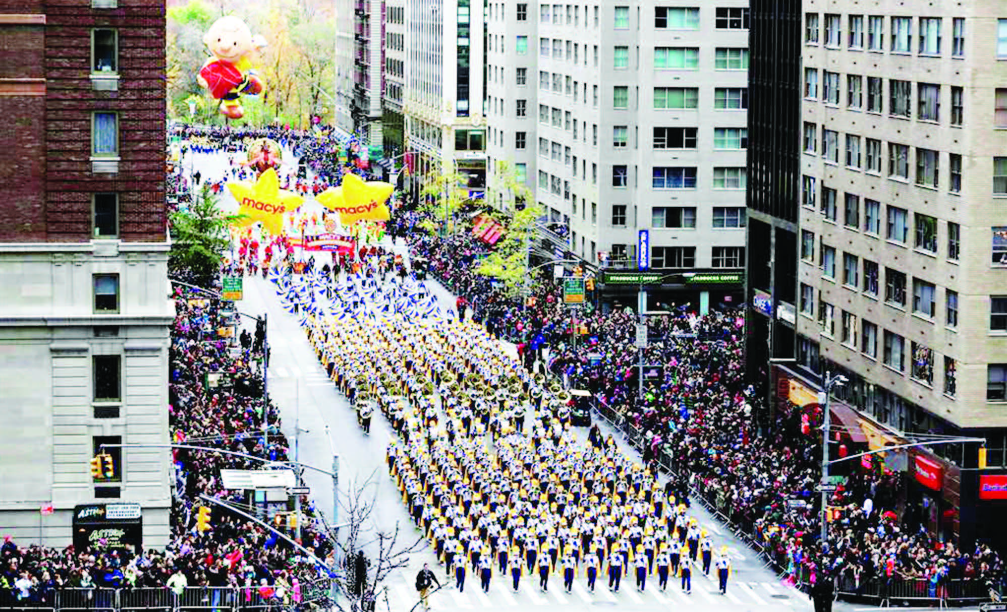 Macy's Parade in New York City, November 24, 2016. A marching band makes its way down 6th Avenue. Photo courtesy Saul Martinez/ Reuters