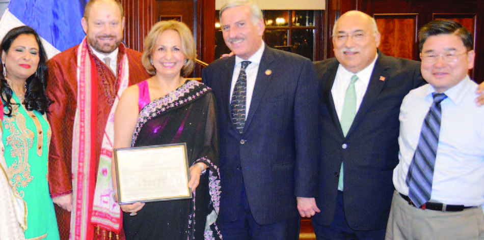 Ranju Batra being awarded the New York City Council citation for her 7 year long journey to get the Diwali stamp. Seen in the picture, from L to R: Neeta Jain, CM Rory Lancman, Honoree Ranju Batra, Assemblyman David Weprin, Ravi Batra and CM Peter Koo.