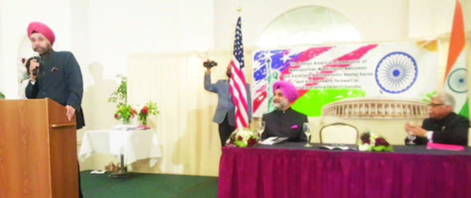 Ambassador Navtej Sarna addressing the gathering at the Reception hosted by Indian American Community of Metropolitan Washington, welcoming Ambassador him and bidding farewell to Ambassador Taranjit Singh Sandhu DCM (seated left)