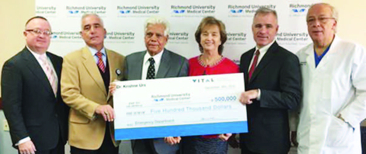 Dr. Krishne Urs, mid-left, making a donation of $500K to Richmond University Medical Center's new emergency department construction project (Image courtesy - silive.com)