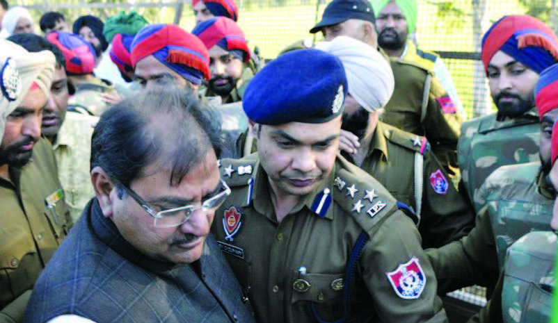 Punjab police arrest INLD Leader Abhay Choutala along with other party workers at Shambhu Barrier near Ambala in Haryana on Thursday; and (below) symbolic digging of the SYL Canal by INLD supporters Photo courtesy: HT