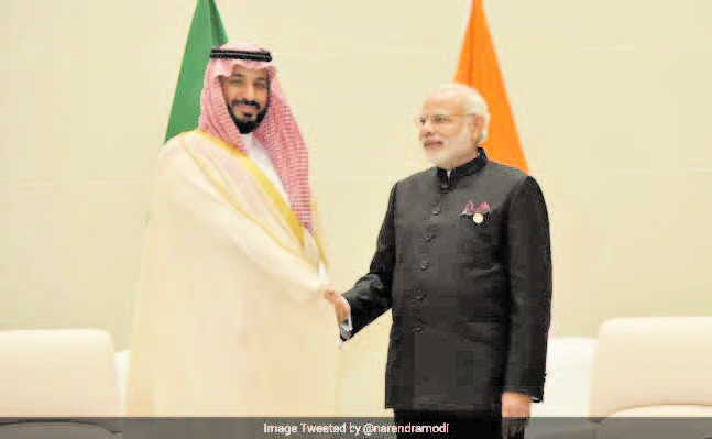 PM Narendra Modi shakes hands with Deputy Saudi Prince Mohammad bin Salman.