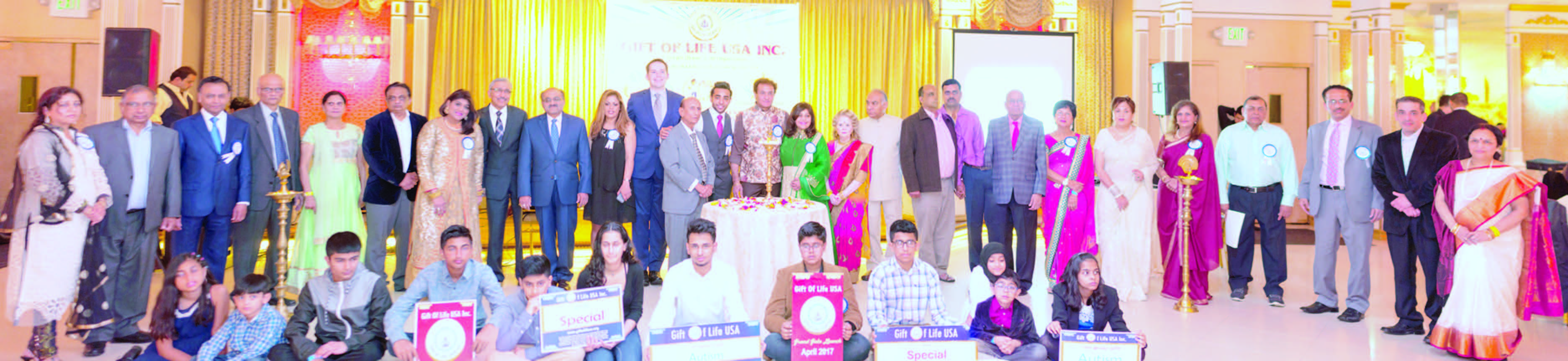 The fired band. (From Left to Right): Kiran Mehta, Vijaybhai (East West Jewelers), Bakul Matalia, Ashvin & Prafula Patel, Anil Soni (PNG Jewelers), Dr. Hetal Gor, Rizwan Qureshi, Naveen Shah, Rupal Sehgal, Kerry Magro, H.K. Shah, Center: Harshil Parekh, Paresh Parekh, Flora Parekh, Manjari Bhatt, Dr. Harshad Bhatt, Swaminatahan, Sunil Jain, Peter Bheddah, Shashi Malik, Pam Kwatra, Neela Pandya, Kamlesh Parekh, Eric Kumar, Joe Grimaldi, Purnima Desai Sitting: Aryan Sharma & Essay Competition Winners - Shreya Shukla, Keerath Kumar, Dhruv Sehgal