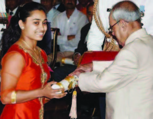 Gymnast Dipa Karmakar receiving Padma Shri from President Pranab Mukherjee