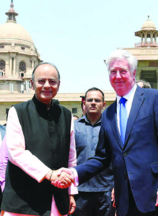 Defence Minister Arun Jaitley shakes hands with UK Defence Secretary Michael Fallon in New Delhi on April 13.