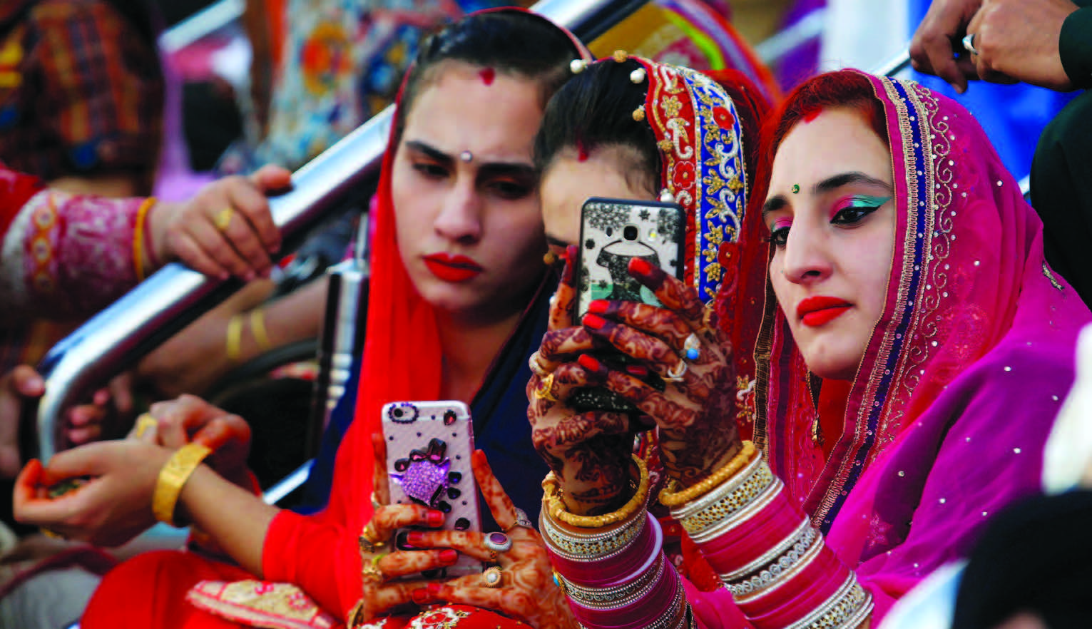 Sikh devotees taking a selfie during the Baisakhi festival at the holy temple of Panja Sahib in Hassan Abdal, Pakistan April 14, 2017. Photo: REUTERS