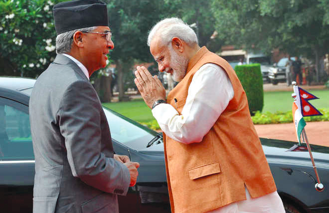 India, China will fully resolve Doklam issue through dialogue: Nepal PM