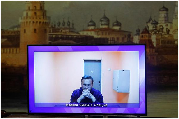 Russian court rules that Kremlin critic Navalny must stay in jail