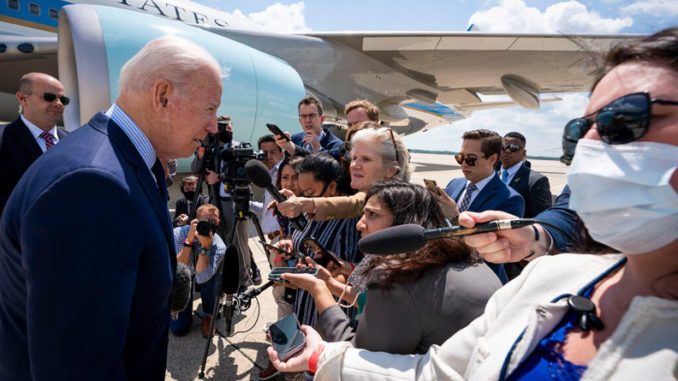 Biden answers questions from the media