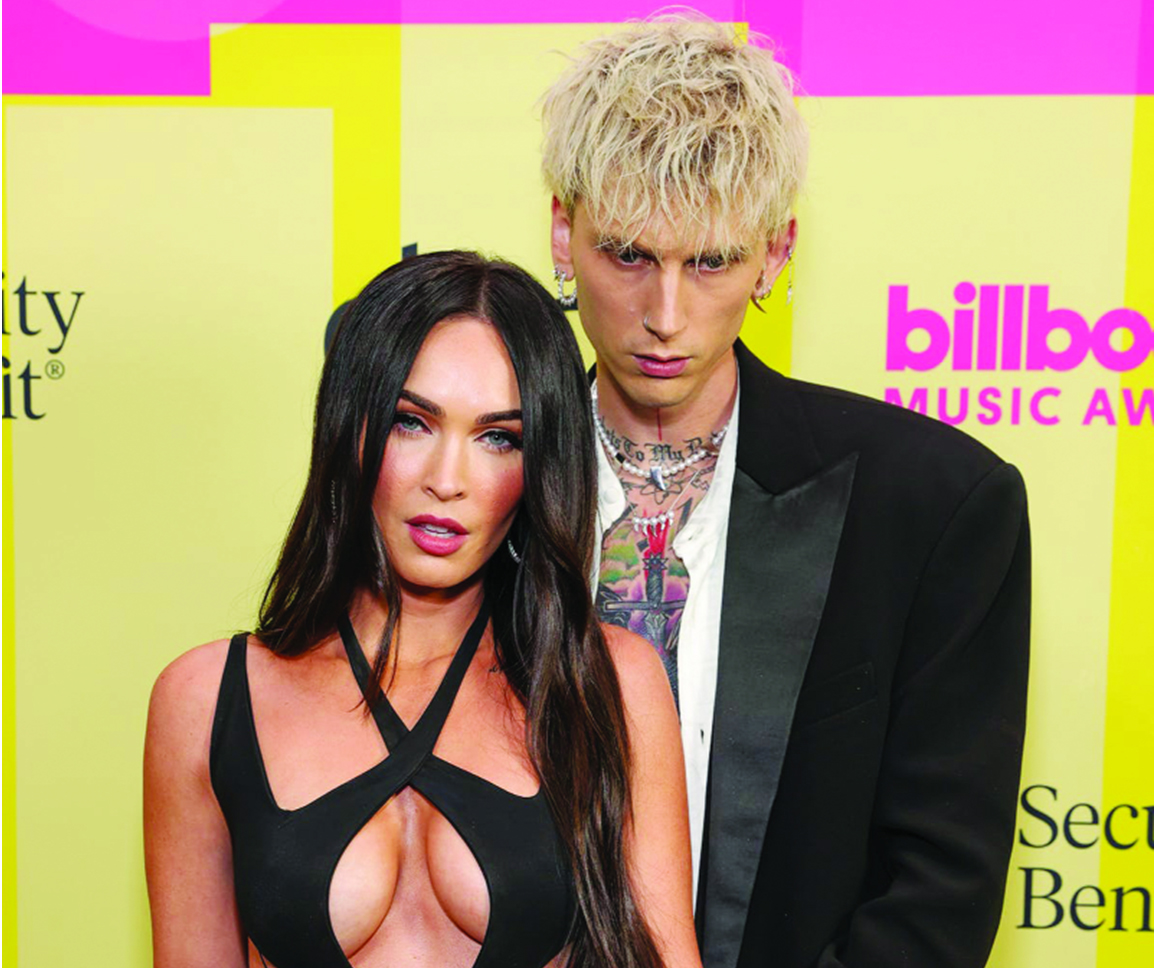 Machine Gun Kelly goes down on one knee to propose to Megan Fox