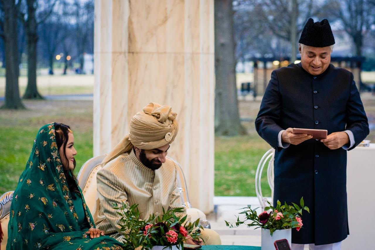 Families gathered during an interfaith wedding celebration